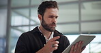 Creative, confused and man with tablet, online and market research for business, thinking and typing. Office, brand manager and competition analysis on social media, browsing and person with tech