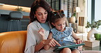 Tablet, teaching and mother with daughter on sofa for elearning, education app and support. Helping, online tutor and kindergarten lesson with woman and child in living room at home for studying 