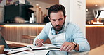 Business owner, man and tablet with notebook in cafe for inventory control, stock management or digital checklist. Hospitality industry, paperwork or writing online order for supply chain or planning