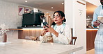 Customer, phone and waiter with coffee service at table for hospitality, takeaway order and thank you. Small business, happy woman or barista with cappuccino beverage for local support or lunch break