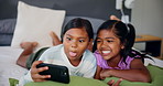 Relax, funny face and kids with selfie in home, laugh and bonding with sister on internet. Happy children, photography and girls in bedroom for picture app, silly and play game online with tongue out