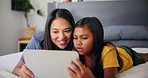 Tablet, mother and conversation with child in home for movie choice, ebook or together in family bedroom. Kid, girl or happy mom with digital technology for learning online, game app or watch cartoon