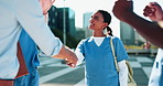 Applause, handshake and medical students with professor in city for achievement, education or success. Congratulations, healthcare and medicine with group of people clapping downtown for motivation