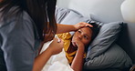 Sick, thermometer and worry with mother and child in bedroom for illness, care and temperature check. Illness, virus infection and cough with girl and parent in family home for disease and fever