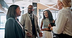 Collaboration, meeting and smile with business people in lobby of office for planning or strategy. Conversation, discussion and teamwork with corporate employee group in workplace for conference
