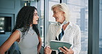 Office, business people and women with tablet for feedback, finance and investment research. Team, financial advisor and mature investor with digital for risk management, report review and discussion