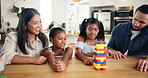 Home, parents and children with blocks for game, cognitive development and bonding together as family. Kitchen, mom and dad with kids for puzzle toys, playing and creativity with support in house