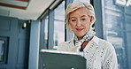Tablet, research and businesswoman by window in office reading stock market development for investment. Digital technology, contact and mature female financial manager with email for finance proposal