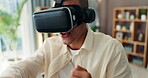 Man, fight and vr glasses at house with boxing games, training and sports match of fitness metaverse. Male gamer, punching and virtual reality headset for workout, futuristic competition and wellness