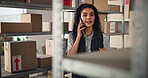 Phone call, warehouse and woman with boxes for delivery, logistics and distribution for shipping. Ecommerce, business and person on smartphone talking for supply chain, contact and online inventory