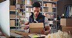 Small business, computer and man with scanner, boxes and preparing of product with label and logistics. Warehouse, entrepreneur and person with stock for supply chain, ecommerce or planning for store
