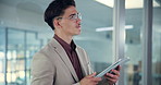 Man, tablet and thinking in hallway at office for research, insight and decision for ethics with journalism. Person, writer and click on application for notes, article and perspective for newsletter