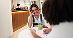 Couple, date and talking with love in cafe for funny conversation, bonding together and connection. Support, people and holding hands with drinks in restaurant for trust, weekend break and flirting