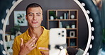 Man, influencer or video recording with ring light or phone for blog, introduction or online tutorial at home. Male person, vlogger or talking with mobile smartphone for social media, vlog or tips