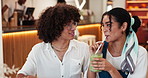 Coffee shop, happy and couple share in cafe for bonding, relax together and enjoy date on weekend. Restaurant, relationship and woman and man sip with beverage, matcha and smoothie for romance