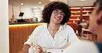 Couple, man and talking on date in cafe with funny conversation, bonding together and connection. Happy, people and coffee with questions in restaurant for relationship, comic story and listening