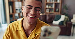 Happy man, phone and texting to relax for online dating, rest or comfort on weekend in modern home. Smartphone, tech and male person with smile in living room for notification and social media app
