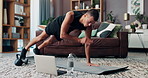 Laptop, fitness and exercise with man in living room for streaming workout class, learning and health. Shoulder taps, wellness and training with person and home gym for sports, virtual course