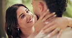 Happy, love and couple in park together for bonding, dating and commitment outdoors. Nature, face and man and woman talking and embrace for affection, relationship and hug for romance on weekend