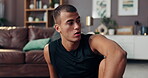 Sweating, fitness and tired with man in living room for exercise, breathing and health. Workout, wellness and resting with person on floor of home gym for sports, bodybuilder, fatigue and training