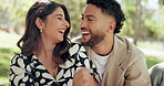 Couple, date and happy in park with snack, bonding and laugh with feeding. People, travel and outdoor with potato chip joke for relationship development, weekend relax or smile for love or picnic