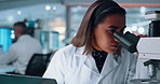 Laptop, microscope and science with woman in laboratory for development of cure, medicine or treatment. Biotechnology, genetic sample and innovation with scientist in clinical trial for research
