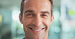 Laughing, face and businessman in office with confidence for startup creative agency growth. Happy, closeup and portrait of male magazine editor from New York with pride for career in workplace.