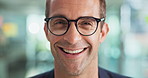 Glasses, laugh and face of businessman in office with confidence for startup magazine agency. Closeup, professional and portrait of male creative editor from New York with pride in workplace.