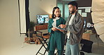 Photography, tablet and planning with people in studio for teamwork, creative director and backstage process. Magazine media, photoshoot and catalog idea with man and woman on set for project