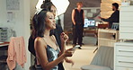 Phone, hair and stylist with woman backstage for production, photography preparation and talking. Beauty, cosmetics and model on set with artist for haircare, creative or happy with results in studio