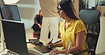 Woman, computer and photographer editing in studio for checking image design and creative magazine. Backstage, picture or person on technology for production, media and digital photoshoot in agency