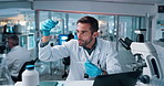 Scientist, man and chemical dropper with microscope for chemistry, smile or forensic research. Biotech, laboratory and analysis with liquid inspection for pharmaceutical study or pathology experiment