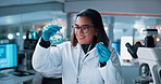 Scientist, woman and chemical with microscope testing for chemistry, smile and medical research. Biotech, laboratory and analysis with liquid inspection for pharmaceutical or pathology experiment
