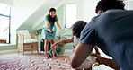 Home, first steps and parents with baby, celebration and bonding together with happiness. Apartment, mother and father with toddler, kid or child development with growth, smile and learning in lounge