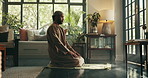 Muslim, faith and man with praying on mat for spiritual meditation, islamic worship or gratitude. Ramadan, person and salah in living room for fasting tradition, praise to Allah or religious blessing