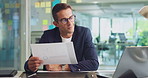 Accountant, laptop and business man with paperwork, financial stats and bookkeeping data. Computer, office and auditor and working with document, analysis and writing review for revenue performance