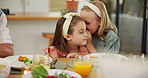 Children, girl and whisper for gossip with lunch secret, healthy food and nutrition meal. Smile, family and talking for rumor with salads of bonding together, parent listening and funny joke at house