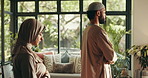 Religion, prayer and Muslim couple in home for fasting, worship and praise to Allah in living room. Religious, spiritual and Islamic man and woman for Ramadan Kareem, salaah and praying for peace