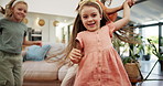 Dance, love and support with family in living room for bonding, energy and care. Happiness, teaching and trust with mother and children in lounge of home for holding hands, music and smile together
