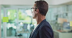 Planning, glass wall and businessman in office with research for creative journalism article. Brainstorming, glasses and male magazine editor reading information for project by board in workplace.