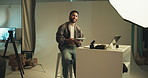 Face, man and tablet for photography in studio with photoshoot results, editing and catalog. Photographer, digital and retouch process in backstage to review picture, production and magazine industry
