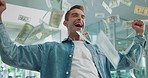 Money rain, success and man celebrate winning lotto, prize and victory in creative startup office. Cash, reward and excited business person cheers for financial freedom, rich and wealth with dollars