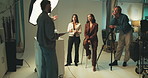 Studio director, creative team and discussion for photography production or planning photoshoot. Photographer, people or fashion models on set with tablet for art, media or collaboration at backstage