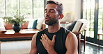 Breathing, meditation and mindfulness with man in living room of home for balance or inner peace. Fitness, namaste and yoga with calm person in apartment for awareness or mental health exercise