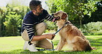 Park, walking and man with leash for dog for adventure, training and exercise together outdoor. Pets, animal care and owner bonding with Golden Retriever in nature for wellness, health and fresh air