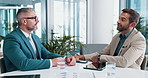 Business, meeting and employees with discussion, communication or planning in office. Mentor, man and tech with graphs for collaboration, workshop or b2b teamwork for kpi goals and target or support