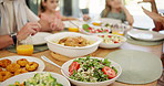 Dining table, food and plate for family in home for holiday, event or reunion with celebration at Easter. Hands, people and conversation with kids, meal and diet for nutrition with lunch at apartment