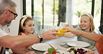 Parents, children and toast glasses in home, lunch or happy with care, bonding or celebration at easter. Mother, father and kids with cheers, juice and excited for food, diet or love in family house