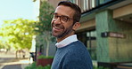 Businessman, face and walk with smile in city for commute, travel and confidence in road. Professional person, happy and glasses in portrait on urban sidewalk for career, job and excited in France