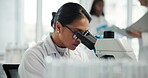 Lab, scientist and woman with glasses, microscope and medical research for breakthrough with tech. Healthcare, serious and person with equipment for science, examination and diagnosis of diseases